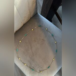 Fossil gold beaded long Necklace